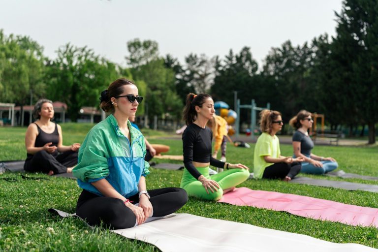 People meditating outside